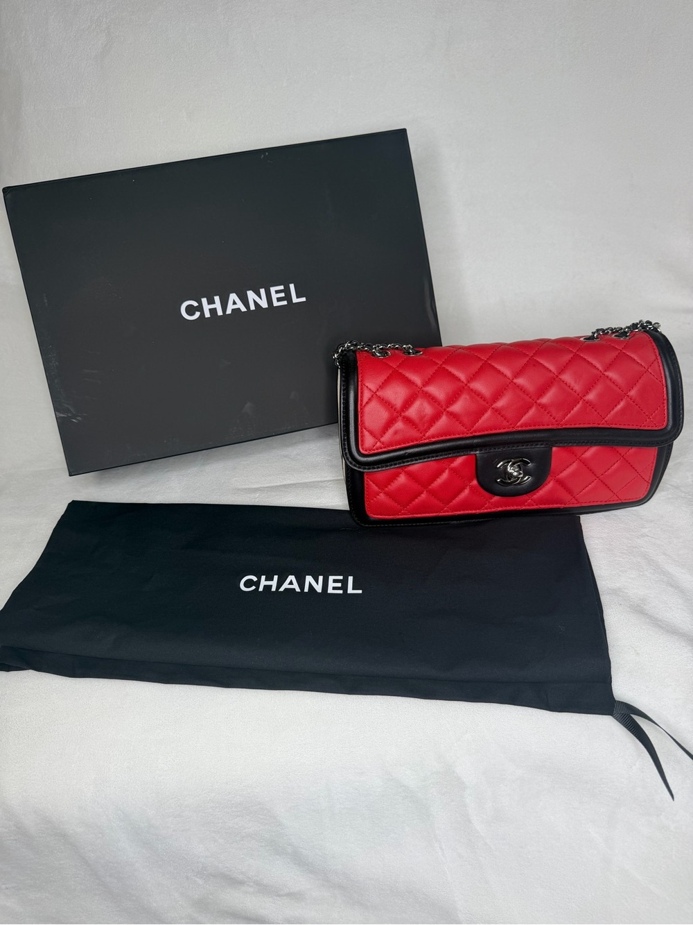 CHANEL Red, Black, and White Quilted Lambskin Single Flap Bag with Chain Strap
